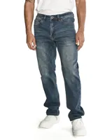Jeans de mezclilla de corte slim para hombre, con diseño de cinco bolsillos y efecto ligeramente desgastado.