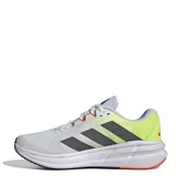 Championes de running Adidas modelo Questar 3, con capellada de malla transpirable en color blanco y detalles en verde lima, gris y naranja. Incorporan amortiguación Bounce 2.0 y plantilla Cloudfoam Plus para mayor confort.