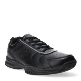 Championes deportivos Lotto de cuero sintético en color negro, con cierre de cordones, diseño de costuras reforzadas y suela de goma antideslizante.