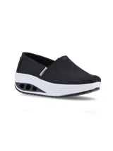 Zapatillas slip-on Hush Puppies modelo Angelo, color negro, confeccionadas en tela canvas con elástico en el empeine para un calce fácil. Presenta una suela de plataforma con tecnología de amortiguación y plantilla de memory foam de alta densidad.