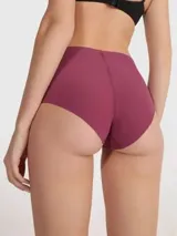 Bombacha hipster de talle alto Calvin Klein Invisibles, color borgoña, sin costuras y con calce flexible. Presenta logo de la marca en la parte superior y refuerzo completo.