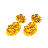 Aros colgantes con base de acrílico amarillo y apliques de strass color mostaza.