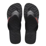 Sandalias tipo ojota Havaianas modelo Track, color negro con detalle de logo en color rojo en las tiras. Presentan una suela con diseño de relieve en zigzag y textura antideslizante.