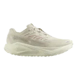 Championes de running todoterreno Salomon Aero Blaze 3 Grvl, color beige claro con detalles en naranja y suela adherente.