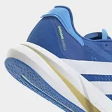 Championes de running Adidas modelo Duramo Speed 2, color azul con las tres tiras laterales en blanco y detalles en amarillo claro. Presentan tecnología de amortiguación Lightstrike en la entresuela y suela de caucho para mayor tracción.