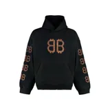 Hoodie Balenciaga de corte oversize en color negro, con estampado frontal y en las mangas del logo de la marca con estética de Bitcoin en tono desgastado.