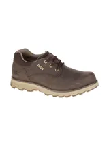 Zapato de cuero impermeable Cat modelo Prez Waterproof, en color marrón oscuro con detalles en tono tostado y suela dentada.