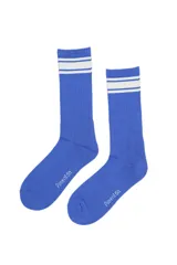 Medias de caña larga color azul, con diseño acanalado y dos franjas blancas horizontales en la parte superior. Incluye el logo de la marca estampado en el empeine.