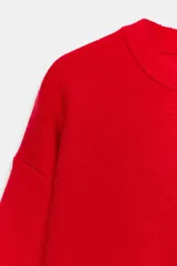 Jersey de punto con cuello redondo y manga larga, con terminaciones en tejido rib en cuello, puños y ruedo.
