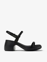 Sandalias de cuero vacuno color negro, con dos tiras finas sobre el empeine, pulsera al tobillo con hebilla ajustable y tacón bloque.