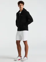 Buzo con capucha Original Penguin, color negro, confeccionado en tejido de felpa (85% algodón y 15% poliéster). Presenta cierre completo, bolsillos frontales, capucha con cordón y logo de Pete bordado en el pecho.