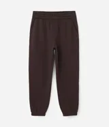 Pantalón jogger de algodón con felpa, color beige, con cintura elástica, cordón ajustable, bolsillos laterales y puños elásticos en los tobillos.