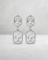 Caravanas colgantes de acero con diseño de doble rectángulo y piedras de cristal transparente.