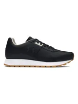 Championes Under Armour modelo W Essential Runner, de diseño retro en color negro con detalles en blanco y suela color caramelo. Presentan una parte superior de nailon con revestimientos de gamuza, plantilla de espuma y entresuela de EVA acolchada.