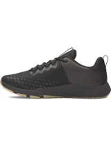 Championes de entrenamiento Under Armour modelo Charged Engage 2, color negro con suela de goma en tono arena. Presentan parte superior transpirable con estampado 3D, refuerzos de TPU en el talón y entresuela Charged Cushioning para mayor amortiguación y respuesta.