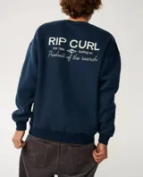 Buzo azul marino Rip Curl con cuello redondo, mangas largas y estampa trasera en color blanco con texto y logo de la marca.
