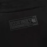 Pantalón de jogging negro con puños elásticos, cintura ajustable con cordón y estampado con logos de la NBA y nombres de equipos.