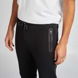 Pantalón de jogging negro de punto con cintura elástica y cordón ajustable.