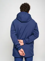 Parka larga de abrigo Umbro color azul marino con capucha y cierre frontal con cremallera.