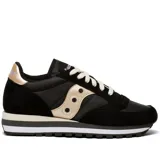 Championes Saucony Jazz Triple de dama, color negro con detalles dorados y suela con plataforma a rayas.