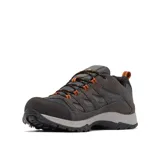 Championes de trekking Columbia modelo Crestwood Waterproof, color gris grafito con detalles en naranja. Presentan una construcción impermeable con tecnología Omni-Tech, entresuela TechLite para amortiguación y suela Omni-Grip para tracción en diversos terrenos.