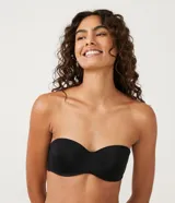 Soutien femenino modelo top, color piel, con copa hueca y tirantes removibles.