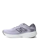 Championes de running New Balance modelo 411, color lila con detalles en gris y suela blanca con refuerzo negro en la puntera.