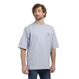 Remera de algodón color negro, de corte holgado, con cuello redondo y logo de la marca estampado en el pecho.