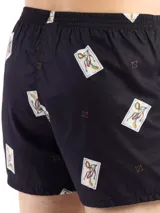 Bóxer de algodón blanco con estampado de flores pequeñas color celeste, con cintura elástica y logo de la marca en el centro.