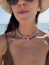 Par de aros de plata 925 con textura trabajada a mano y cierre mariposa.