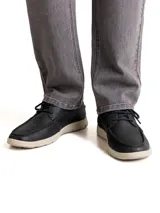 Zapato casual de cuero azul navy de la marca Rockford, modelo Adam. Cuenta con suela de goma blanca, cordones y detalles de costuras visibles.
