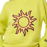 Buzo de punto Rip Curl color amarillo neón, con diseño de sol en el frente y logo de la marca en el puño. Presenta cuello redondo, mangas largas y un calce relajado.