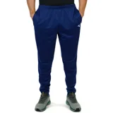 Pantalón deportivo Diadora de hombre, color azul marino, con cintura elástica y bolsillos laterales con cierre. Presenta un pequeño logo blanco en el muslo derecho.