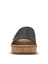 Sandalias tipo chinela Hush Puppies con plataforma de corcho y banda ancha de cuero negro en el empeine.