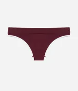 Bombacha tipo bikini de corte clásico, confeccionada en tejido de poliamida texturizado con tecnología seamless. Presenta un diseño liso en color bordó con bordes en contraste color blanco y detalle de logo bordado en el frente.