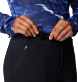 Pantalón de senderismo Columbia modelo Vast Canyon, de color negro, corte de tiro alto con cintura parcialmente elástica y cinturón integrado. Incorpora tecnologías Omni-Heat Infinity y Omni-Shield para repeler líquidos y retener el calor corporal, con rodillas articuladas y bolsillos con cremallera.