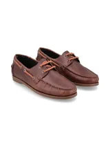 Mocasines tipo náutico Hush Puppies color marrón, confeccionados en cuero con cordones de cuero en contraste y suela de goma.