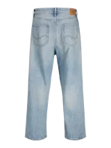 Jean celeste de corte baggy, tiro alto y diseño clásico de cinco bolsillos. Confeccionado en tejido denim con acabado stonewash.