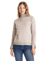 Polera de tejido fino con cuello alto, manga larga y detalle de tajo en los puños.