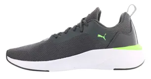 Championes deportivos Puma Erupter, color gris con detalles en verde lima y suela blanca. Presentan diseño de malla transpirable, cierre con cordones y refuerzo lateral con logo de la marca.