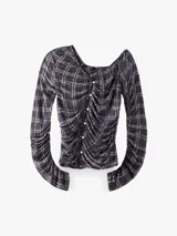 Top off-shoulder de manga larga con estampado de cuadros en tonos morados y beige. Confeccionado en tejido elástico y ligero, presenta un diseño fruncido en la parte frontal con cierre de botones.