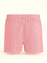 Bóxer de algodón blanco con estampado de flores pequeñas color celeste, con cintura elástica y logo de la marca en el centro.