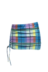 Minifalda de lycra con estampado escocés en tonos celeste, azul, amarillo, naranja y violeta.