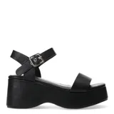Sandalias de plataforma alta con pulsera al tobillo Miss Carol Krova, color negro, con tira frontal ancha y hebilla metálica plateada.