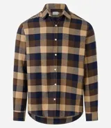 Camisa de algodón con estampado de cuadros en tonos azul, blanco y gris. Cuenta con cuello camisero, mangas largas abotonadas y corte comfort.