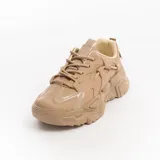 Championes de mujer color beige con plataforma. Se recomienda comprar un talle más del habitual.