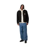 Pantalón de jean negro de corte recto y relajado, inspirado en la ropa de trabajo, con costuras en contraste y bragueta con cremallera.
