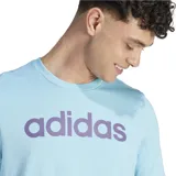 Remera celeste de algodón con logo Adidas estampado en color lila en el pecho.
