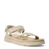 Sandalias de estilo deportivo Miss Carol modelo Balora, color beige, con tiras de ajuste rápido con velcro sobre el empeine y el talón, y base flatform liviana con suela dentada.