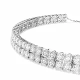 Gargantilla de Swarovski, modelo Matrix, con doble hilera de circonias blancas engarzadas en baño de rodio. Ajustable con cierre de bola deslizante.